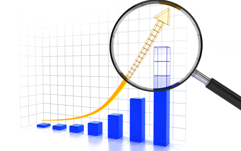 Magnifying glass focusing on a rising arrow in a 3D bar graph, illustrating the analysis of trending Amazon products.